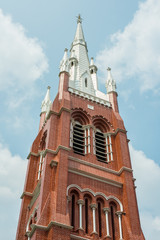 Fototapeta na wymiar The tower of holy trinity Cathedral in Yangon, Myanmar.