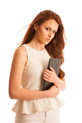 Fototapeta premium Business woman brousing the web on a tablet isolated over white