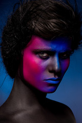art man make up with pink and blue paint