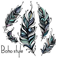 Hand drawn feathers. ink vector illustration. boho style design elements. ethnic creative doodles. isolated on white background