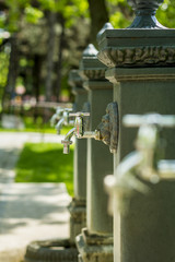 Water taps outside in a park