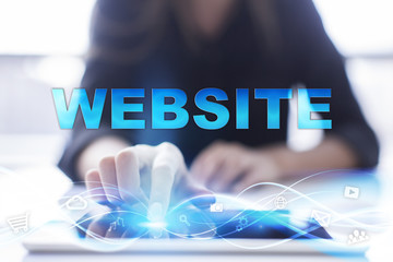 Woman is using modern tablet pc, presssing on touch screen and selecting 