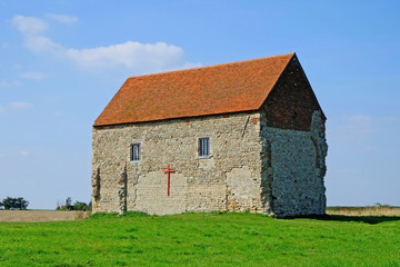 Fototapeta na wymiar The Saxon Chapel of St Peters-on- the- Wall at Bradwell on Sea Essex was built by St Cedd in 654 AD.
