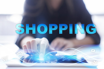 Woman is using modern tablet pc, presssing on touch screen and selecting 