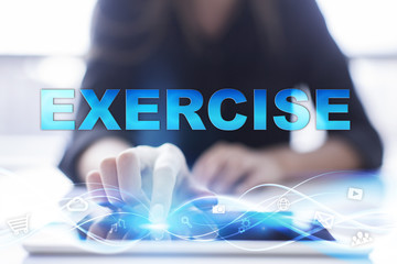 Woman is using modern tablet pc, presssing on touch screen and selecting 