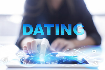 Woman is using modern tablet pc, presssing on touch screen and selecting 