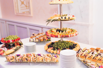Various sweet sliced fruit on a buffet table
