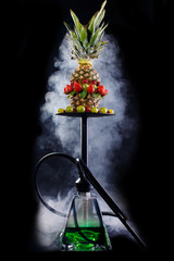 Fruit aroma Hookah isolated on black background © podushko