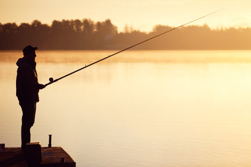 Fishing on morning lake