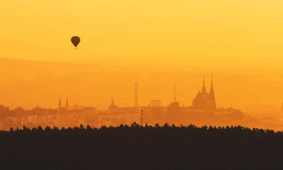 Morning over Brno - Czech Republic, Sunset over the City, Silhouette of Cathedral Petrov and Hot Air Balloon - obrazy, fototapety, plakaty