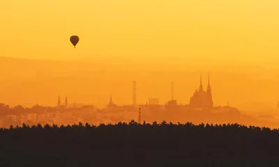 Foto op Canvas Morning over Brno - Czech Republic, Sunset over the City, Silhouette of Cathedral Petrov and Hot Air Balloon © Dvorakova Veronika