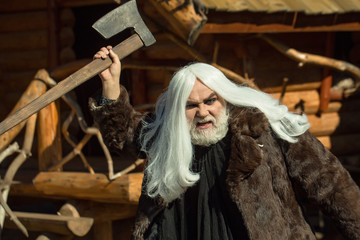 Brutal old druid with axe