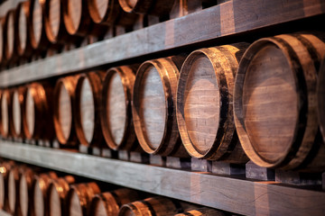 Wine barrels in wine cellar
