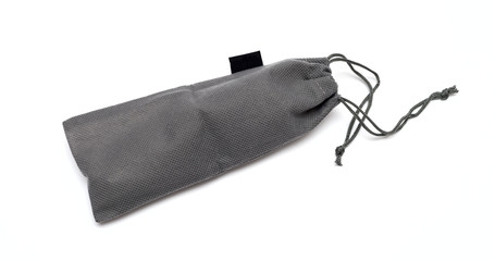 Grey drawstring bag packaging isolated over white background