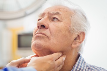 Doctor examining a patient