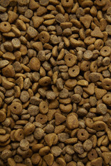 A full page of animal kibble background texture
