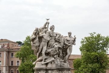 Sculpture at Vittorio Emanuele II Bridge, Rome, Italy.