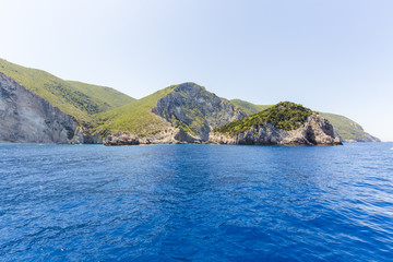 Fototapeta premium Cruise around Zakynthos, views from the sea on the island, Greece, background.