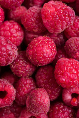 Fresh ripe raspberries macro shot, summer fruit background