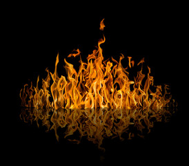 yellow dark large flame with reflection on black