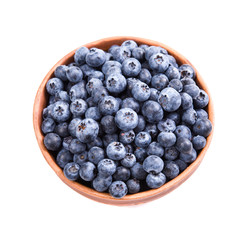 Bowl of ripe blueberries isolated on white