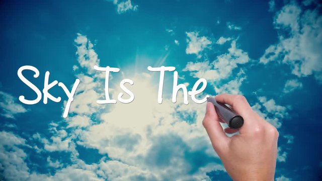 Sky Is The Limit -  concept with hand writing on the sky. Man writing. Blue sky with clouds time lapse.Words red circled. Business, technology, internet concept. Film look. 4k