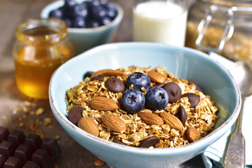 Granola with chocolate and almond - healthy breakfast concept.
