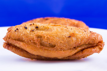 Indian food - bread roll with fish stuffing