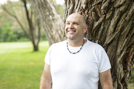 men outdoors close to 50s in forest