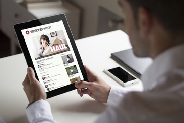 businessman vlog with tablet pc