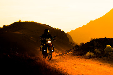 Obraz premium silhouette of the mountain motor drive