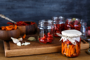 dried tomatoes in glass jars