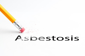 Closeup of pencil eraser and black asbestosis text. Asbestosis. Pencil with eraser.