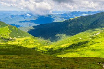 Obraz premium Picturesque Carpathian mountains landscape in summer, view from the height, Ukraine.
