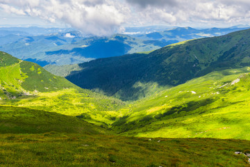 Picturesque Carpathian mountains landscape in summer, view from the height, Ukraine.