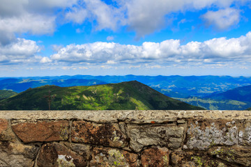 Stone wall of astronomical observatory on top of Pip Ivan mountain, nature landscape in Carpathians, Ukraine.