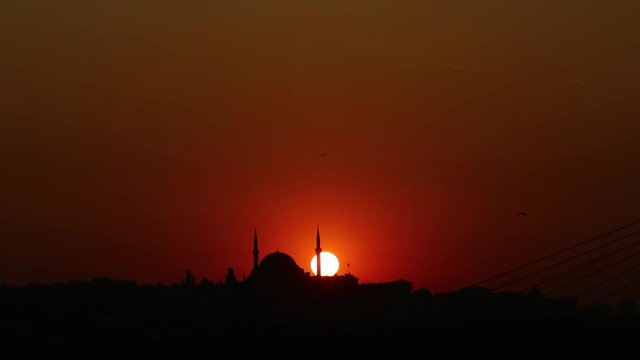 sunset behind the mosque in Istanbul image