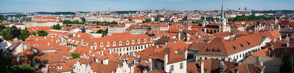 Naklejka na ściany i meble Roof of European city covered with red tiles