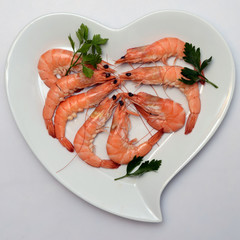 Shrimp or pink prawn in heart shaped plate