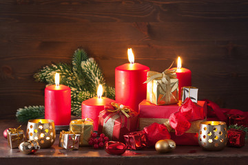 red and golden christmas gift boxes decoration candles