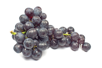 Black grapes cluster isolated on white