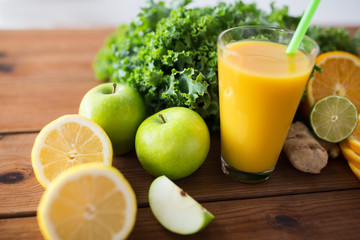 glass of orange juice, fruits and vegetables