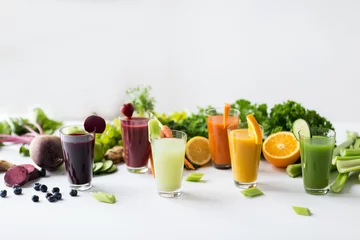 Foto op Plexiglas glasses with different fruit or vegetable juices © Syda Productions