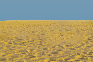 Sand and Blue Sky Background