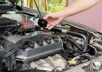 Fototapeta premium open engine oil cap for checking