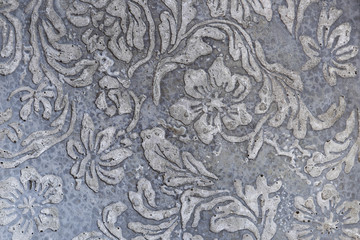 Flower pattern on cement wall background