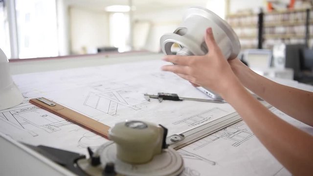 Student girl in engineering training, design office