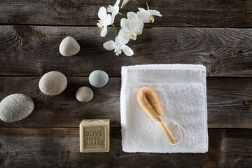 wellbeing still life for detox spa with cleansing loofah brush