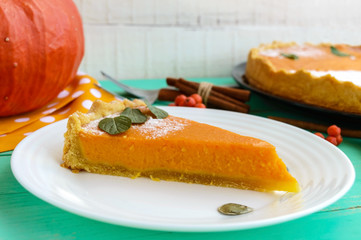 Sweet pumpkin pie. A piece on a white plate. Dietary vegan dish.
