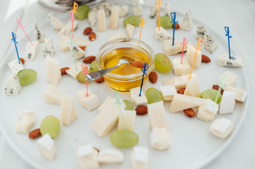 Delicious canapes with honey as event dish